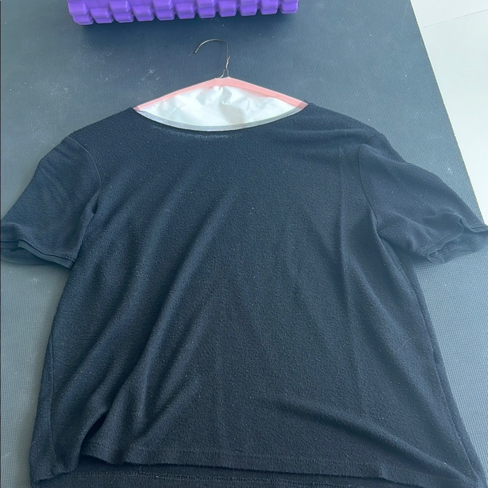 Zara women’s black top. Loose fitting. Size small.